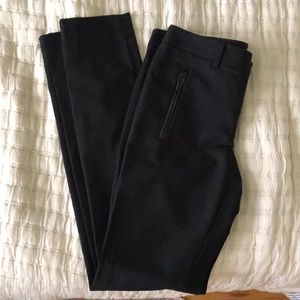 Fabulous Club Monaco skinny black slacks with leather trim details!